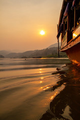 Sunset on the Mekong River by Slow Boat