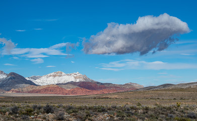 USA, Nevada, Clark County, Red Rock Canyon National Conservation Area. Snow covers the mountains...