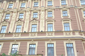 Fototapeta na wymiar windows on building facade