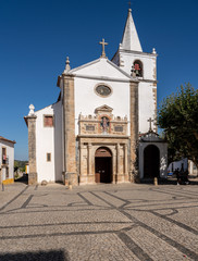 Fototapeta premium Main entrance into the Igreja de Santa Maria in the old medieval walled city of Obidos in Portugal