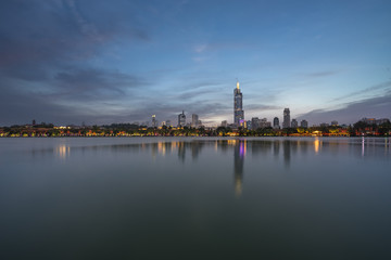 Fototapeta na wymiar illuminated city waterfront downtown skyline, Nanjing, China.