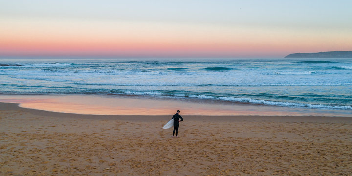 Surfer at Curl Curl Beach, Sydney Australia aerial