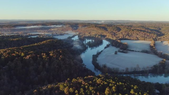 aerial view of fall colors on bluff over looking War Eagle river