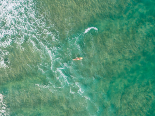 Surfer at Byron bay, Australia