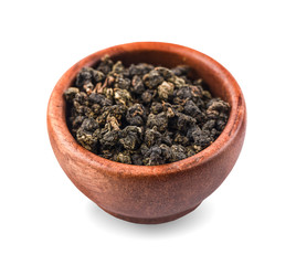 Dry oolong tea leaves isolated on white background