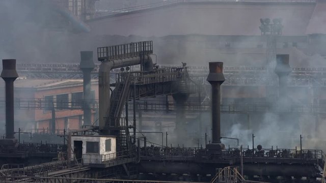 Industrial factory pollution, large smoke from pipes in atmosphere, near city, unclean air, poor visibility, stuffy - (4K)	