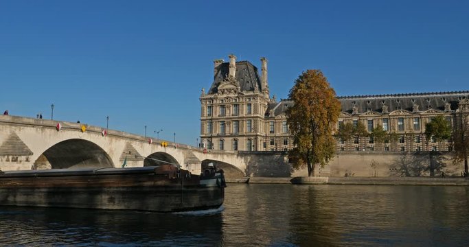 The pont de la Concorde overcrossing the river Seine. Paris, France. The pont de la Concorde overcrossing the river Seine. In the background is the Louvre museum building.
