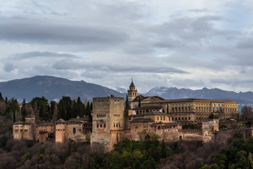 Fototapeta na wymiar Alhambra on a cloudy day viewed from San Nicolas view point, Granada, Spain