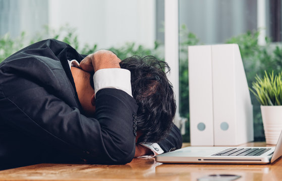 Business Man Unhappy Sad Job Head Down On Laptop Computer