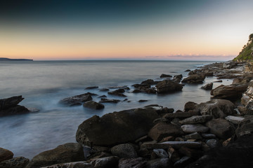 Sydney beach sunset with rock pools