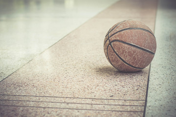 Old basketball on the Terrazzo floor.