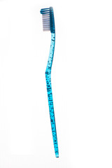 Clear blue toothbrush on white background. Health Concept for teeth.