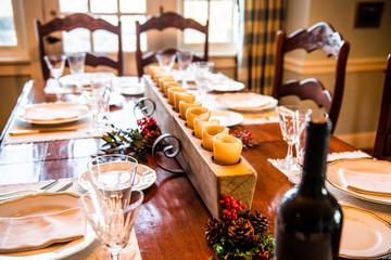 A luxurious dining room table set for a holiday meal