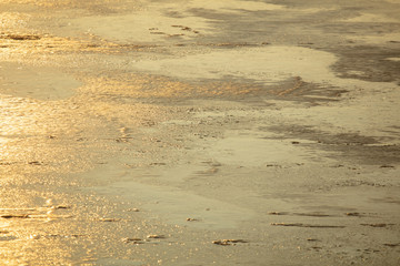 Ice on the lake at dawn of the sun