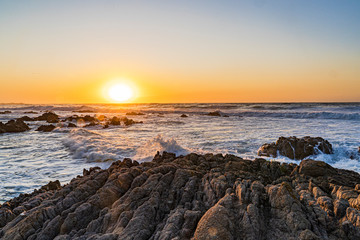 Sunset on the rocky coastline at Pacific Grove
