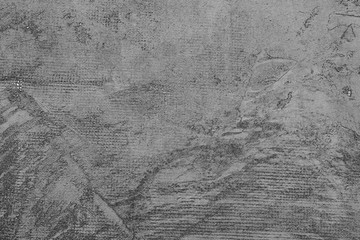 Texture of a concrete wall with cracks and scratches which can be used as a background