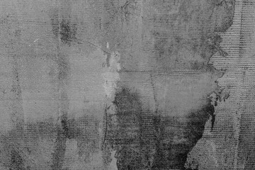 Texture of a concrete wall with cracks and scratches which can be used as a background