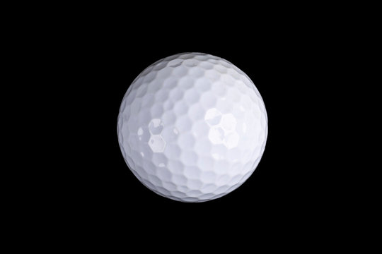 Golf ball isolated on black background. White golf ball isolated over black
