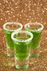 Glasses with a green cocktail