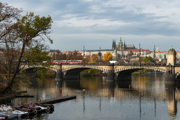 River Vltava and castle of Prague on a sunny day in autumn