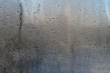 Drops on glass. Close-up background
