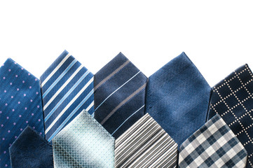 An even row of men's ties on a white background in isolation. Banner for design with blank space for text.