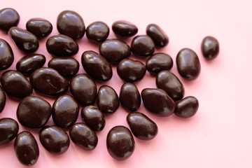 Chocolate balls with raisin, top view, dark chocolate