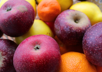 Fresh natural winter fruits, apple, orange, quince