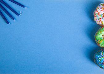 colorful doughnuts blue background studio