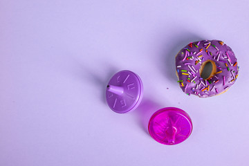 colorful doughnut dreidel purple background studio