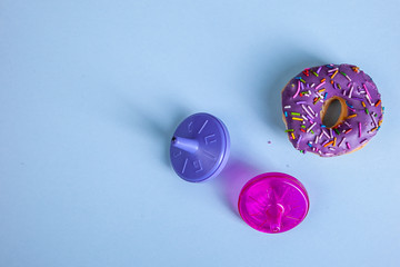colorful doughnut dreidel blue background studio