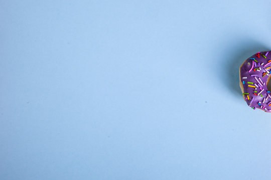 colorful doughnut blue background studio