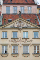Fototapeta premium Old Town Market Place, decorative facade of tenement houses, Warsaw, Poland