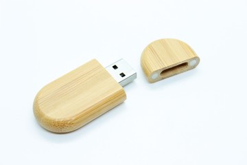 Wooden flash drive located on a white background