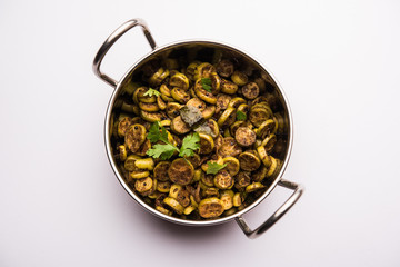 Tendli / Kundroo sabzi or Kovakkai Poriyal also known as ivy gourd, served in a bowl or karahi. selective focus