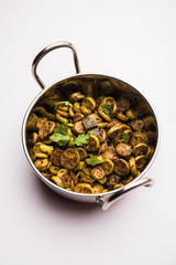 Tendli / Kundroo sabzi or Kovakkai Poriyal also known as ivy gourd, served in a bowl or karahi. selective focus