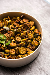 Tendli / Kundroo sabzi or Kovakkai Poriyal also known as ivy gourd, served in a bowl or karahi. selective focus