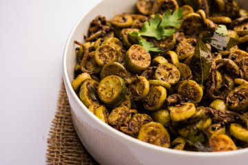 Tendli / Kundroo sabzi or Kovakkai Poriyal also known as ivy gourd, served in a bowl or karahi. selective focus