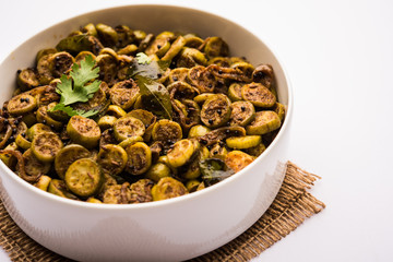 Tendli / Kundroo sabzi or Kovakkai Poriyal also known as ivy gourd, served in a bowl or karahi. selective focus