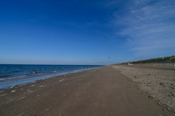 beach holland sand blue sky sunny day wind