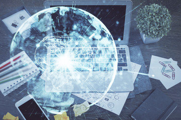 Multi exposure of business theme icons and work space with computer background. Concept of success.
