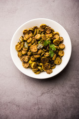 Tendli / Kundroo sabzi or Kovakkai Poriyal also known as ivy gourd, served in a bowl or karahi. selective focus
