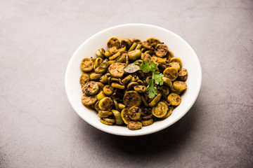 Tendli / Kundroo sabzi or Kovakkai Poriyal also known as ivy gourd, served in a bowl or karahi. selective focus