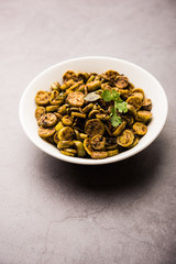 Tendli / Kundroo sabzi or Kovakkai Poriyal also known as ivy gourd, served in a bowl or karahi. selective focus