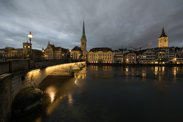 zurich switzerland, old town with the historic buildings and churches on the limmat river in the...