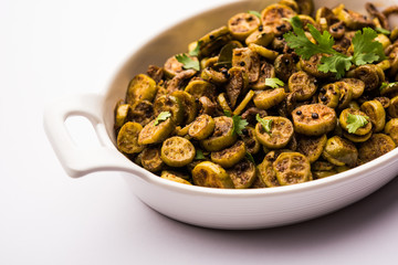 Tendli / Kundroo sabzi or Kovakkai Poriyal also known as ivy gourd, served in a bowl or karahi. selective focus