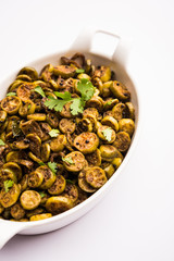 Tendli / Kundroo sabzi or Kovakkai Poriyal also known as ivy gourd, served in a bowl or karahi. selective focus