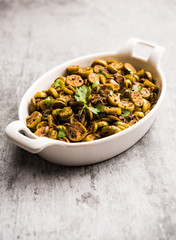 Tendli / Kundroo sabzi or Kovakkai Poriyal also known as ivy gourd, served in a bowl or karahi. selective focus