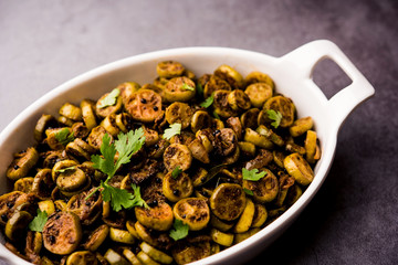 Tendli / Kundroo sabzi or Kovakkai Poriyal also known as ivy gourd, served in a bowl or karahi. selective focus