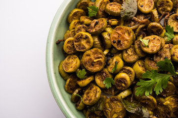 Tendli / Kundroo sabzi or Kovakkai Poriyal also known as ivy gourd, served in a bowl or karahi. selective focus